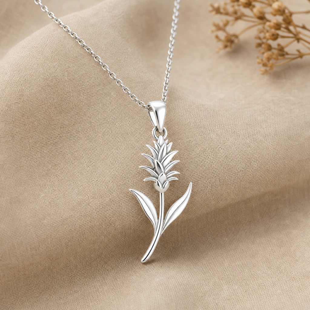 Close-up of silver bromeliad flower pendant necklace