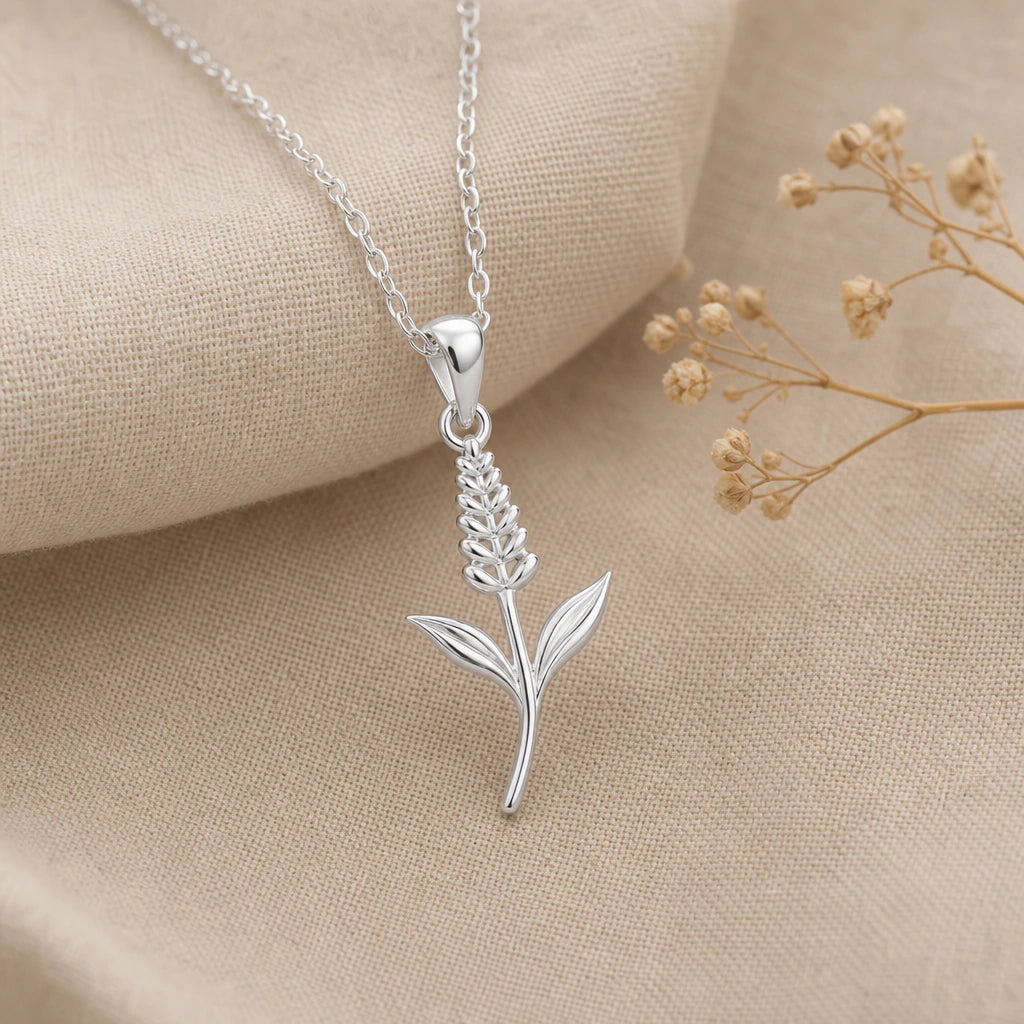 Close-up of silver veronica pendant with flower spike and two leaves