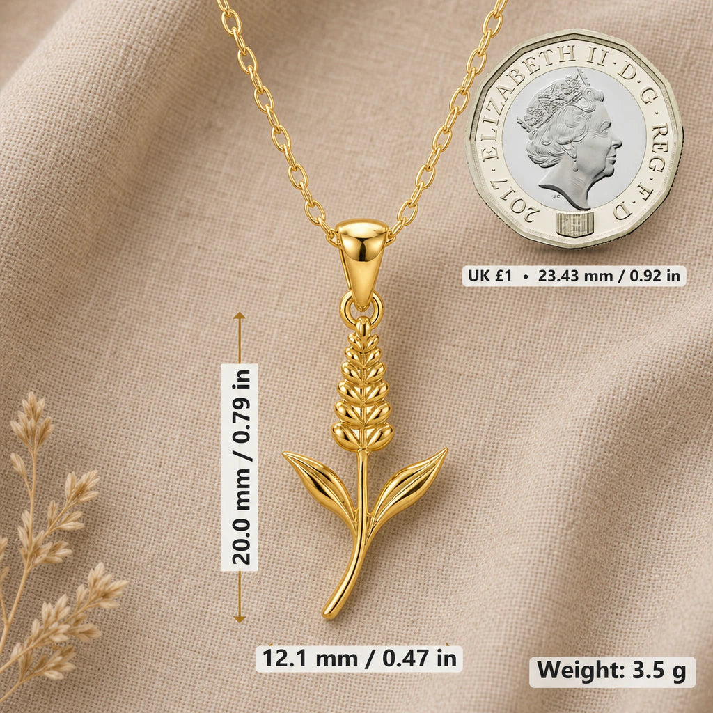 Veronica necklace size image showing 20 mm height, 12.1 mm width and 3.5 g weight beside a UK pound coin