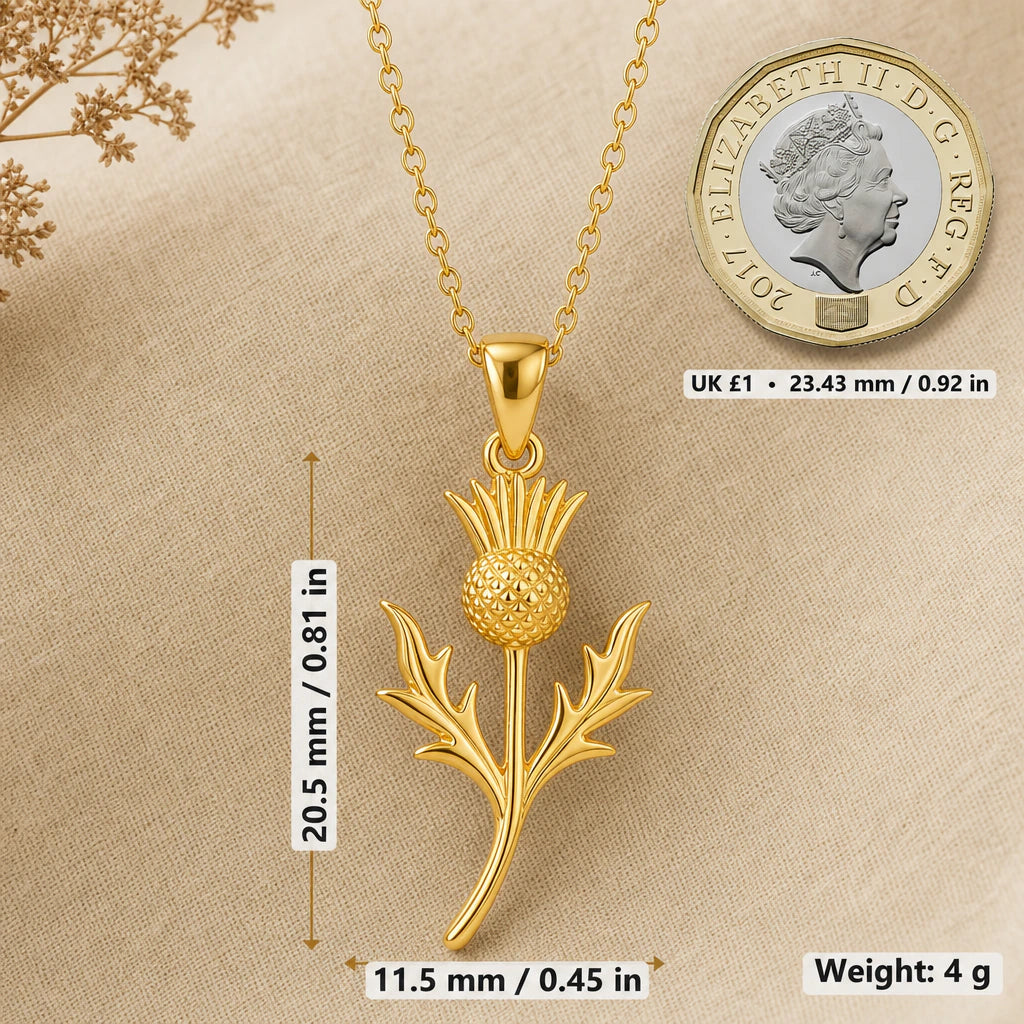 Thistle necklace size image showing 20.5 mm height, 11.5 mm width and 4 g weight beside a UK pound coin
