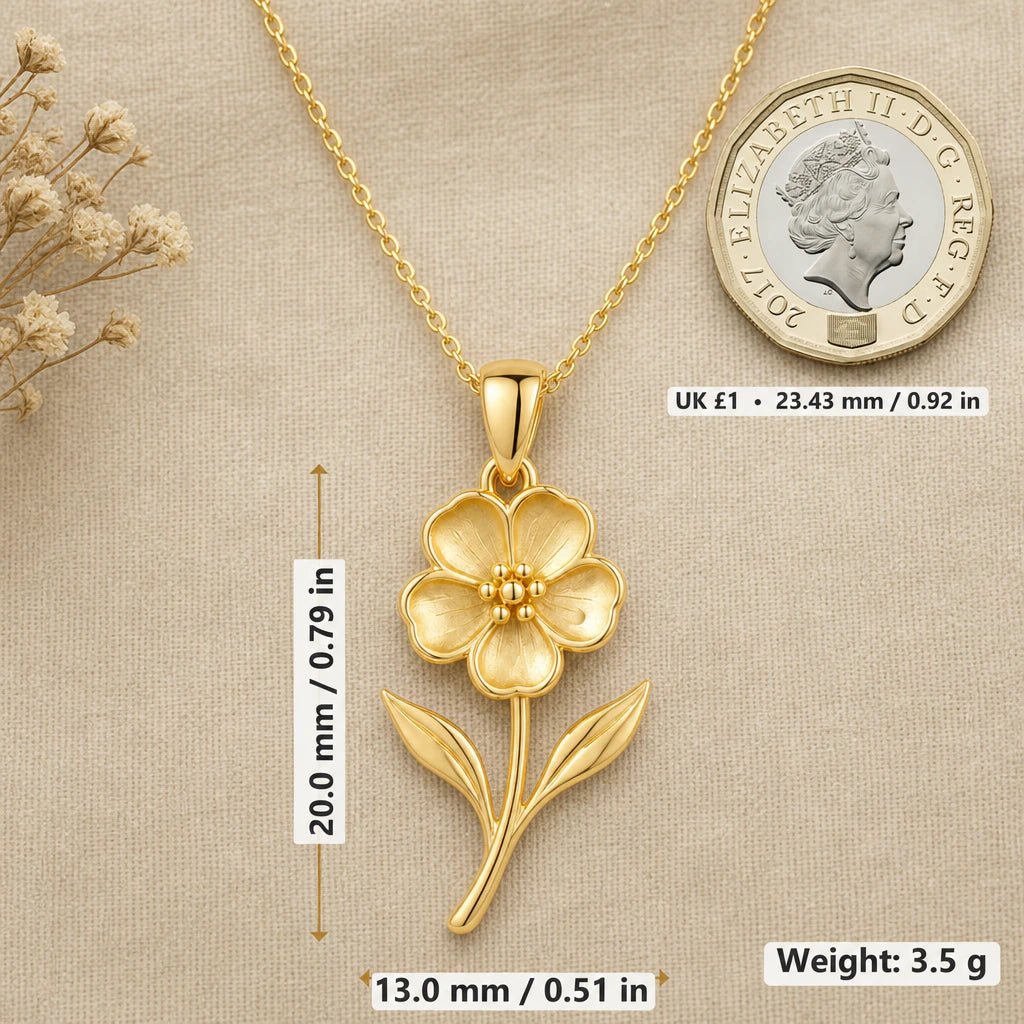 Waxflower pendant necklace dimensions 20 mm by 13 mm, weight 3.5 g, shown beside a one pound coin