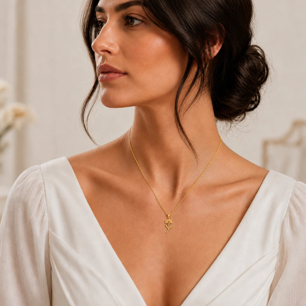 Sweet pea flower pendant necklace worn by a model