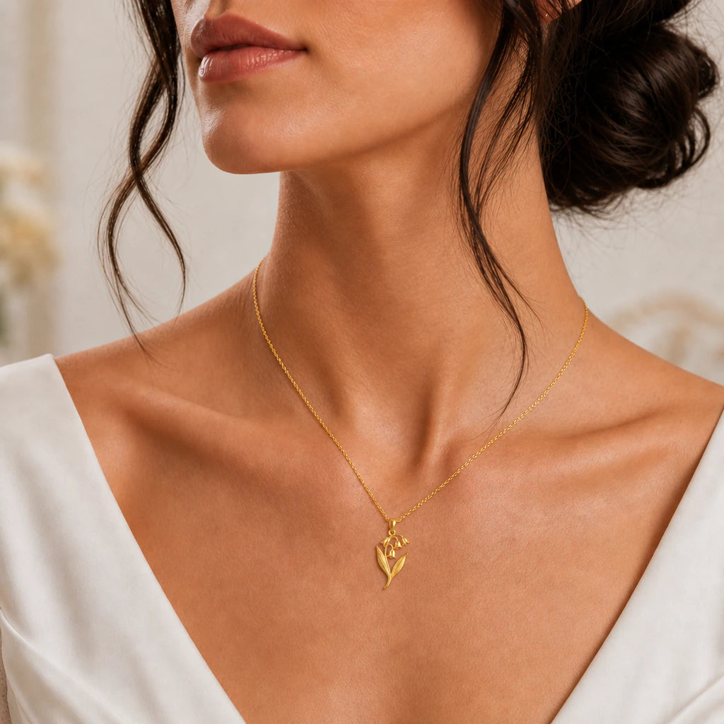 Lily of the valley pendant necklace worn, close-up