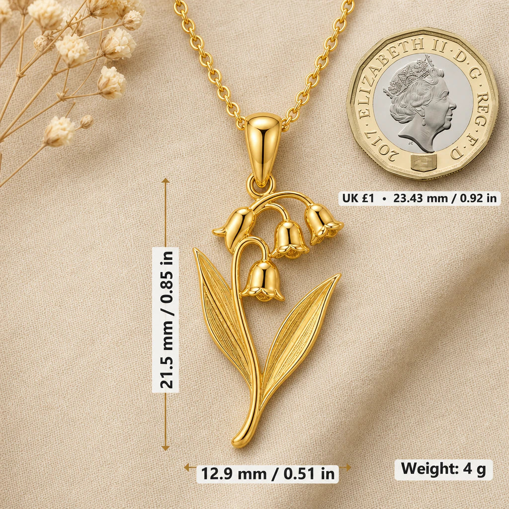 Lily of the valley necklace size image showing 21.5 mm height, 12.9 mm width and 4 g weight beside a UK pound coin