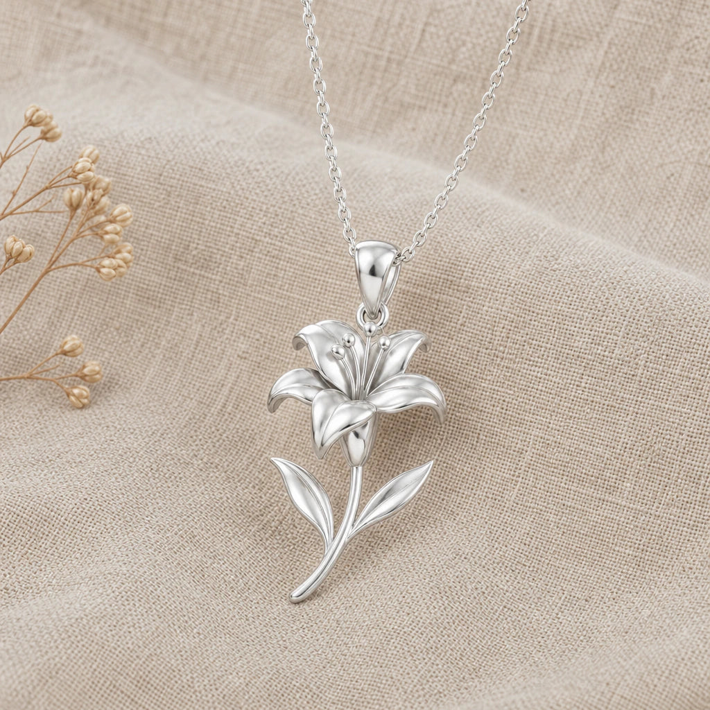 Close-up of silver trumpet lily pendant with curled petals and stamens