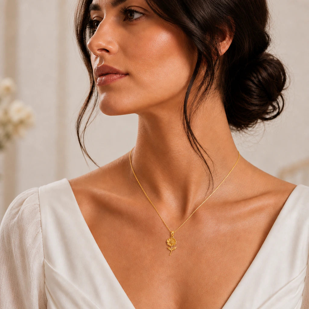 Open poppy bloom pendant necklace worn by a model