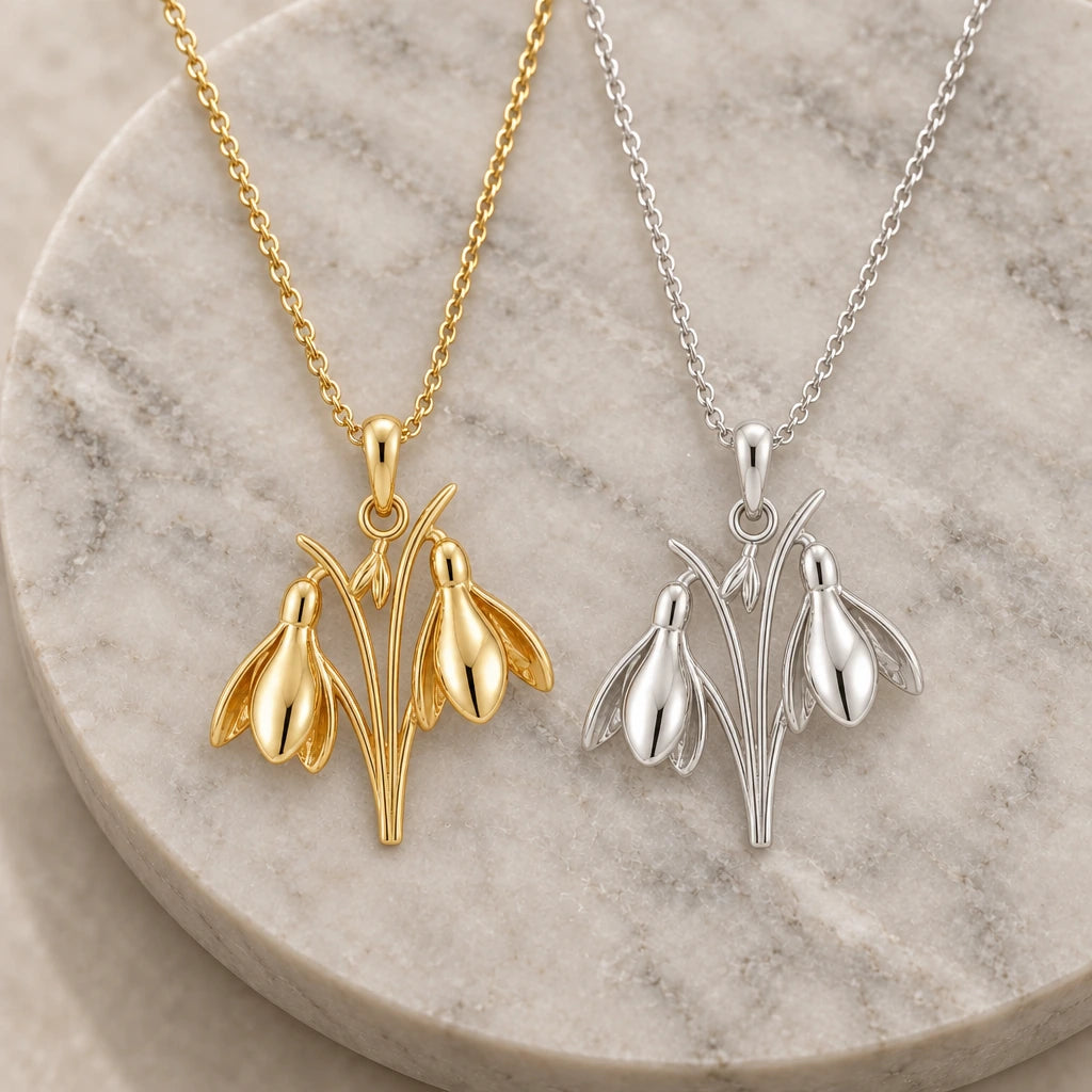 Snowdrop Flower pendant necklace in silver and gold finishes side by side