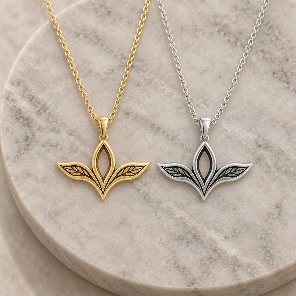 Elven Leaf Wing pendant necklace in silver and gold finishes side by side