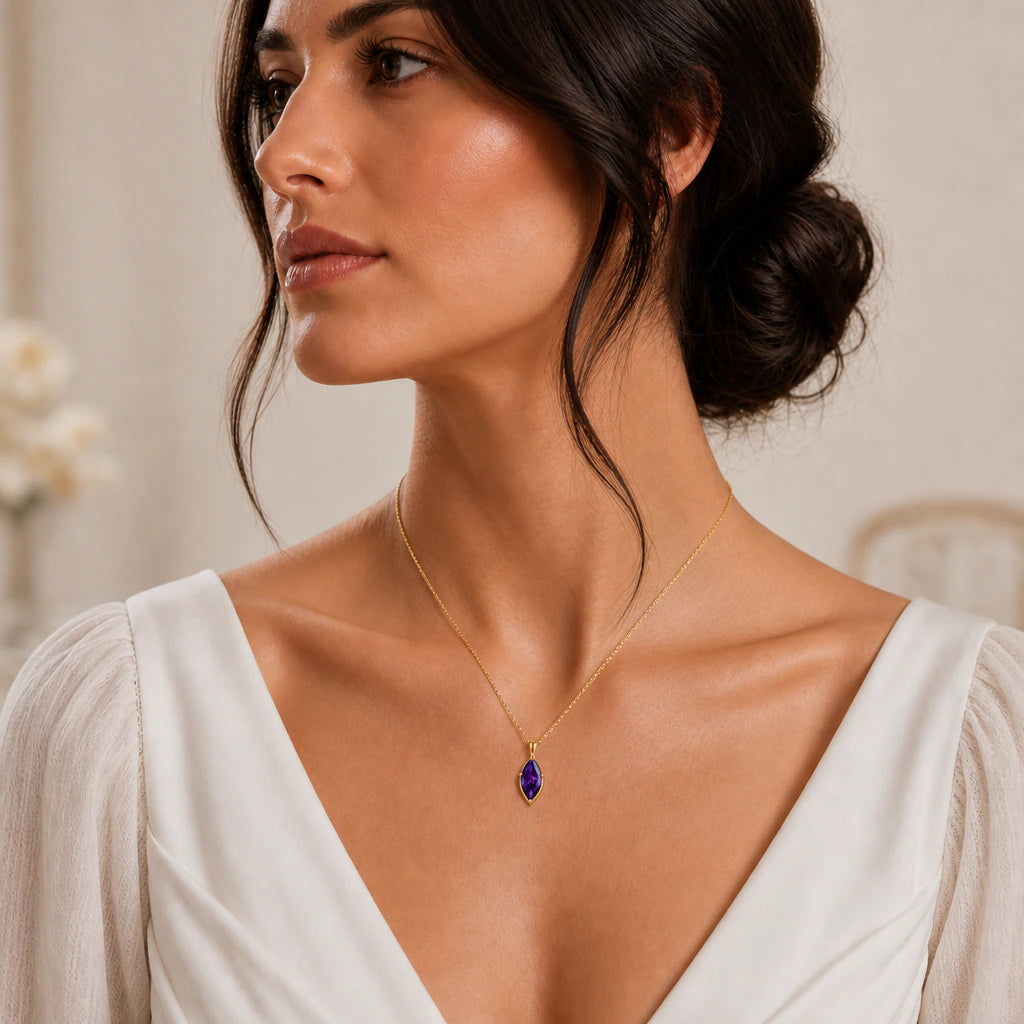 Marquise birthstone pendant necklace worn by a model