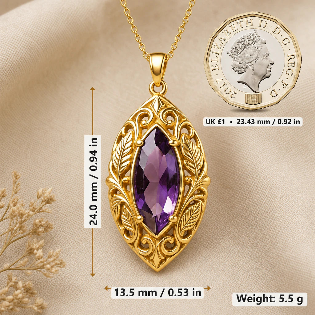 Leaf vine necklace size image showing 24 mm height, 13.5 mm width and 5.5 g weight beside a UK pound coin
