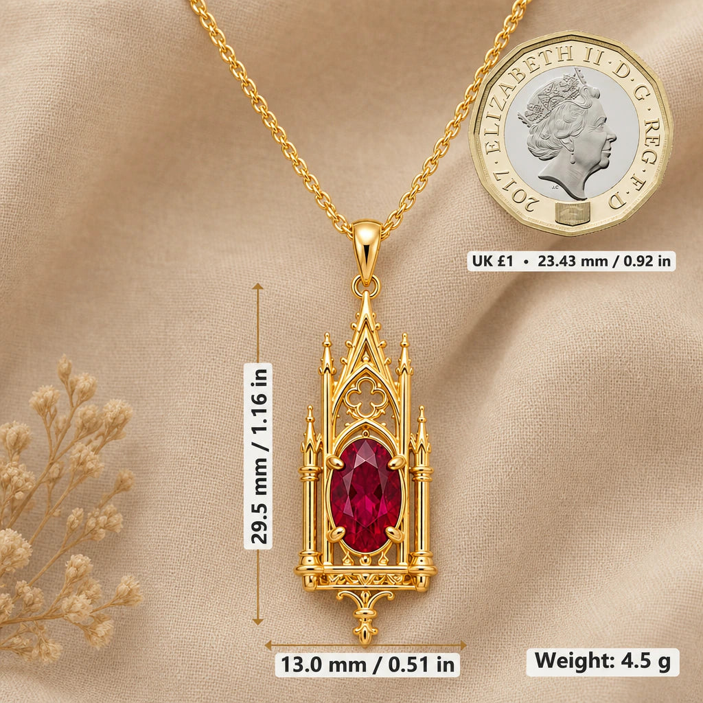 Gothic arch necklace size image showing 29.5 mm height, 13 mm width and 4.5 g weight beside a UK pound coin