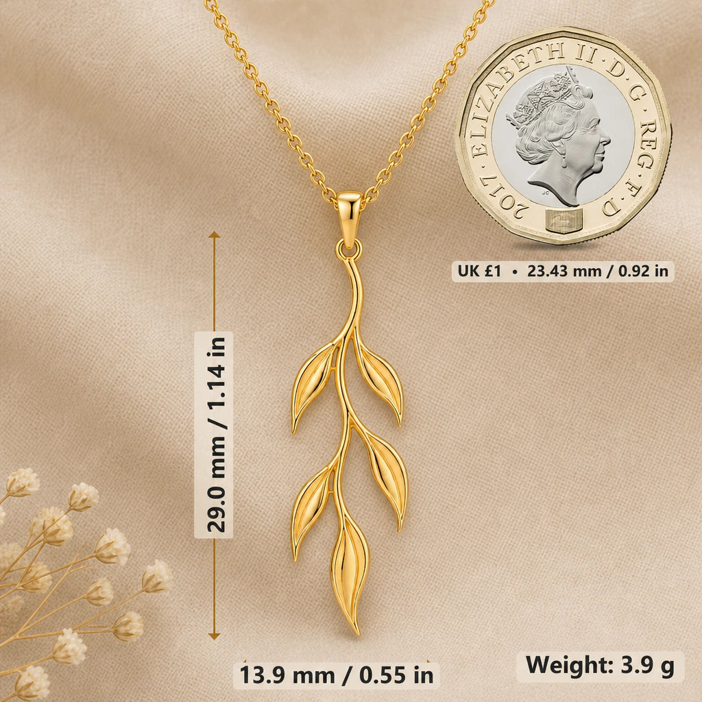 Willow branch necklace size image showing 29 mm height, 13.9 mm width and 3.9 g weight beside a UK pound coin