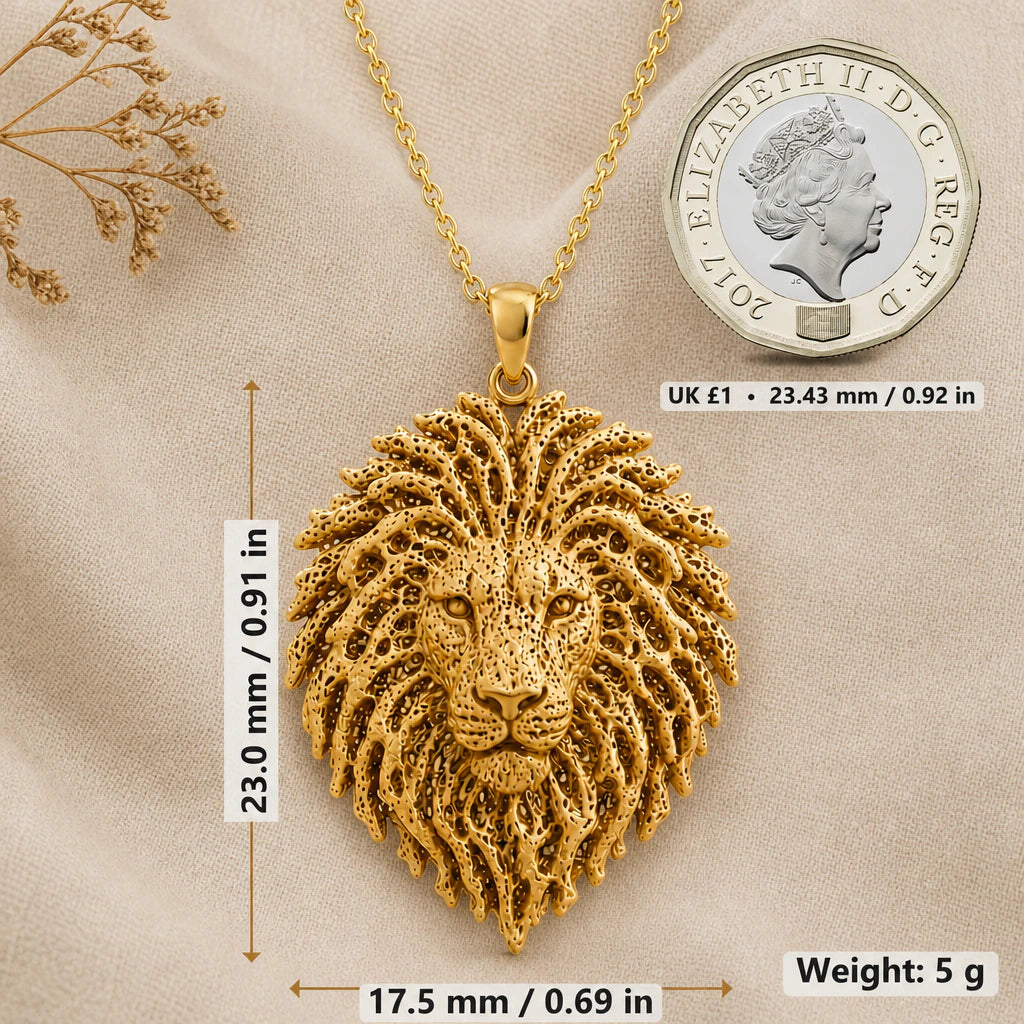Lion head necklace size image showing 23 mm height, 17.5 mm width and 5 g weight beside a UK pound coin