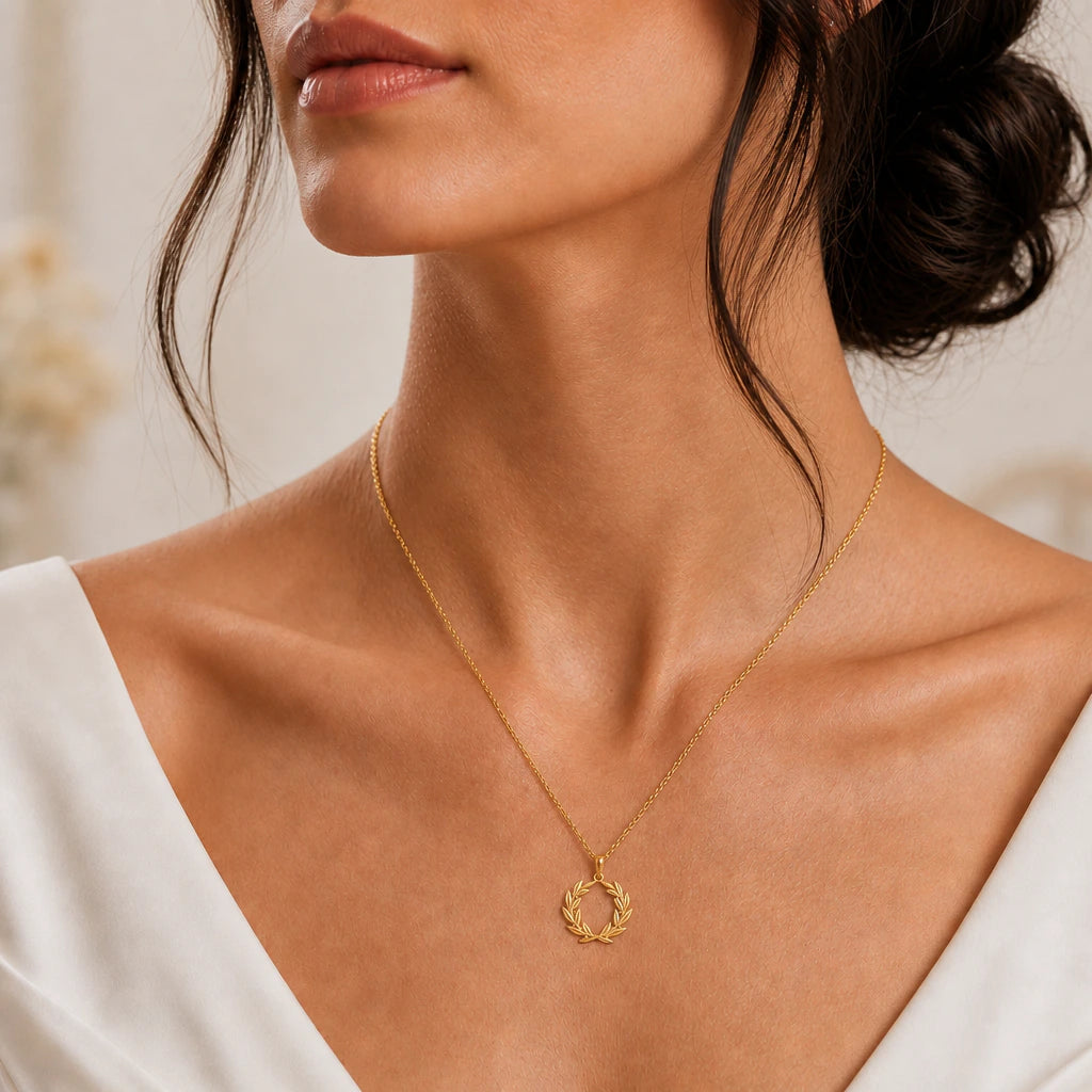 Laurel wreath pendant necklace worn, close-up