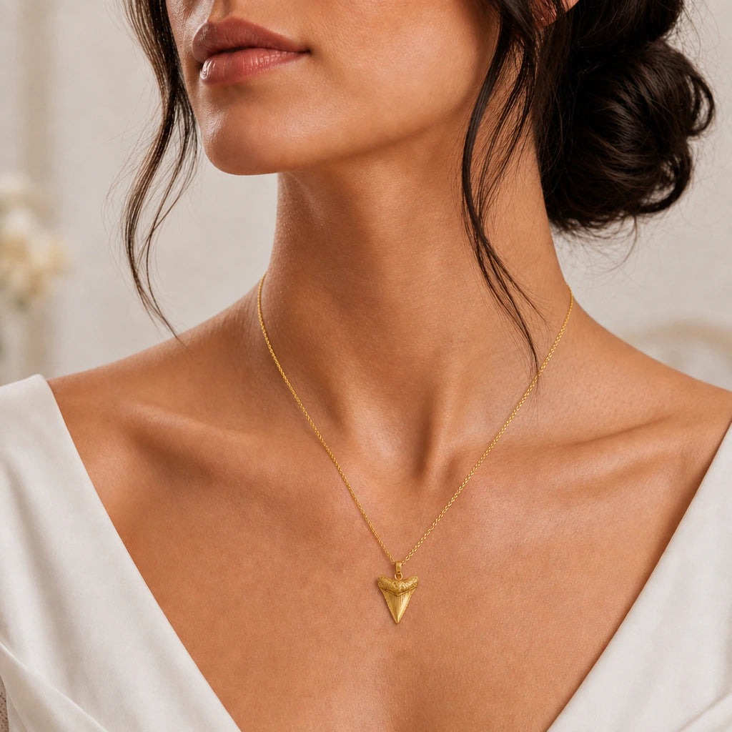 Megalodon tooth pendant necklace worn, close-up