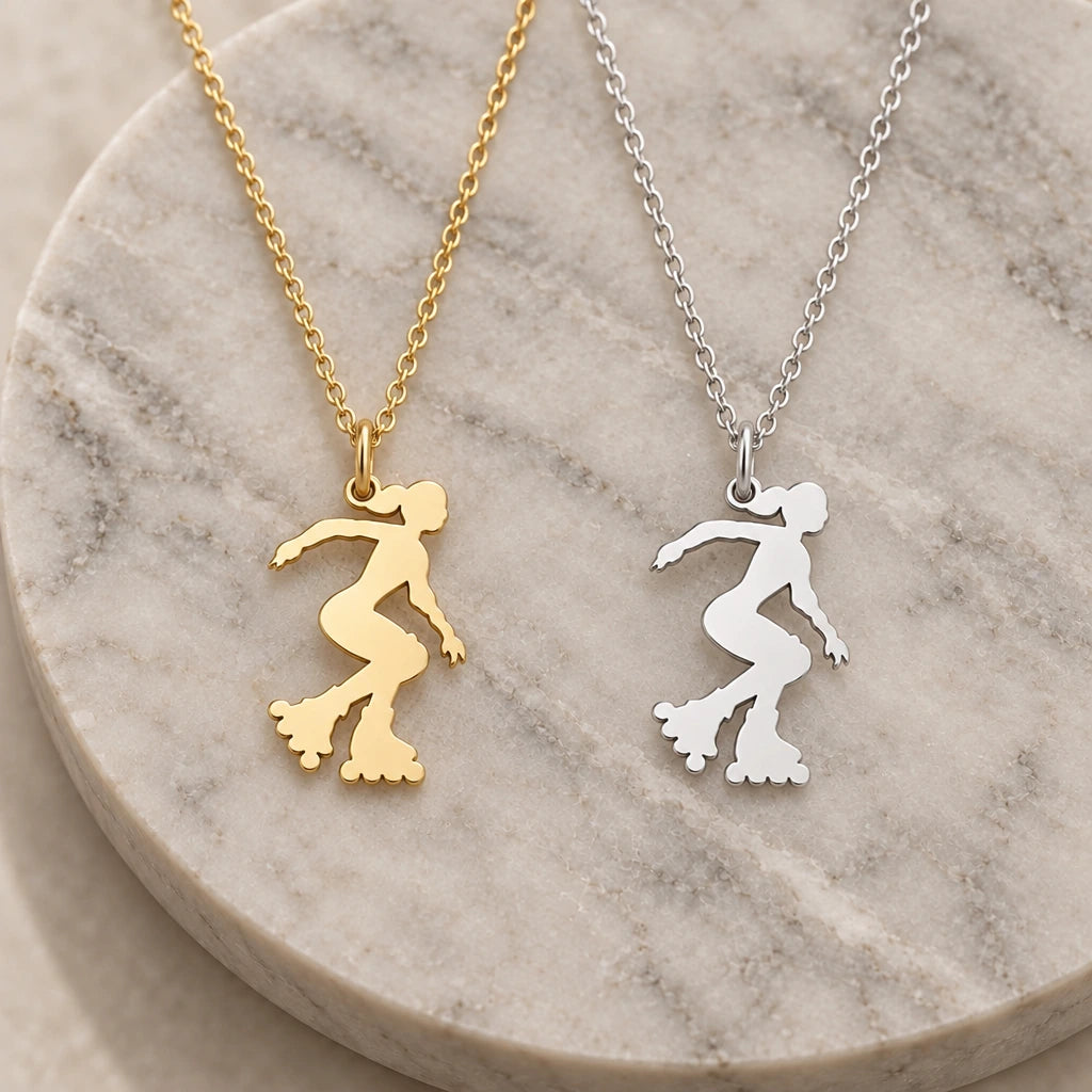 Roller Skater pendant necklace in silver and gold finishes side by side