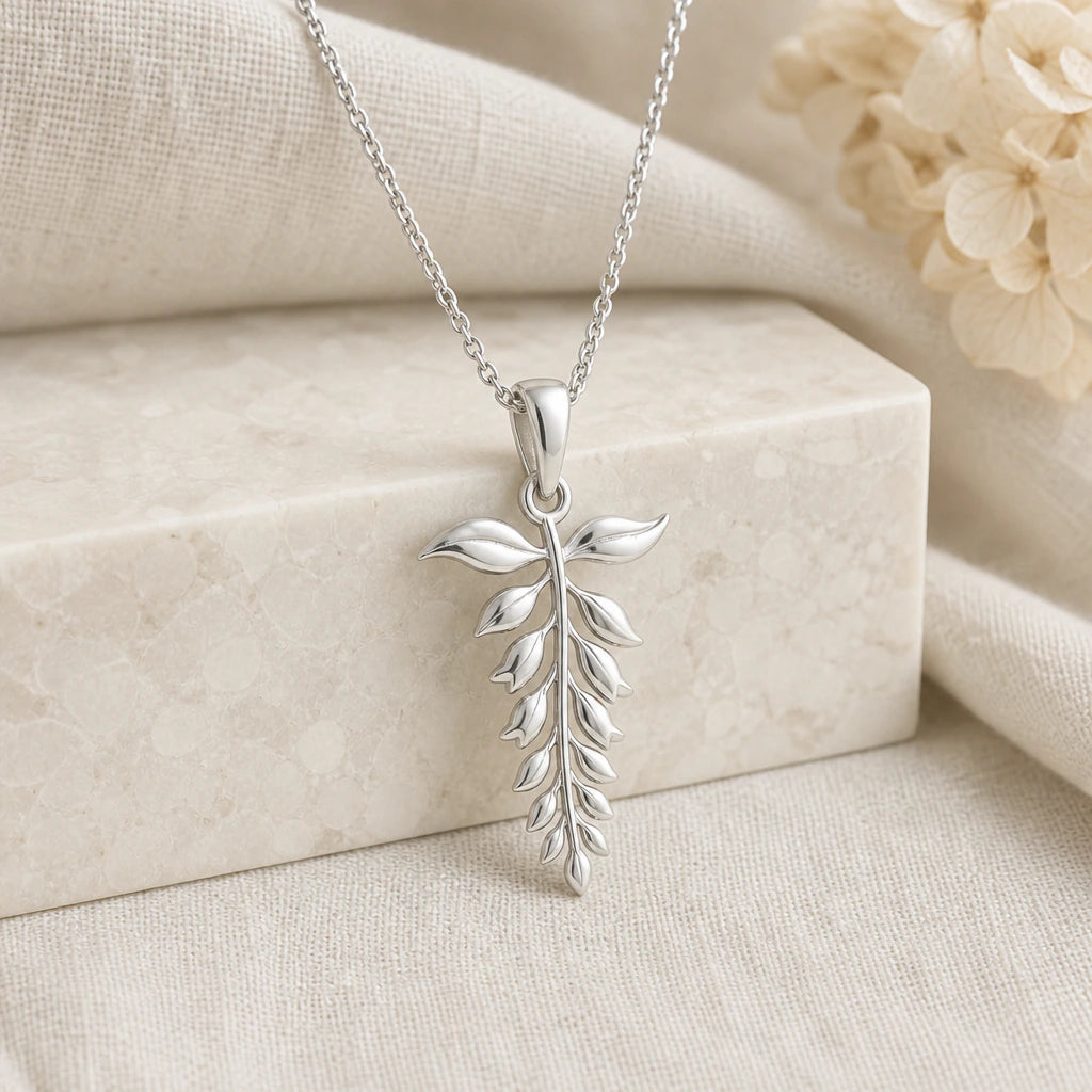 925 sterling silver wisteria flower pendant necklace on softly folded cream linen