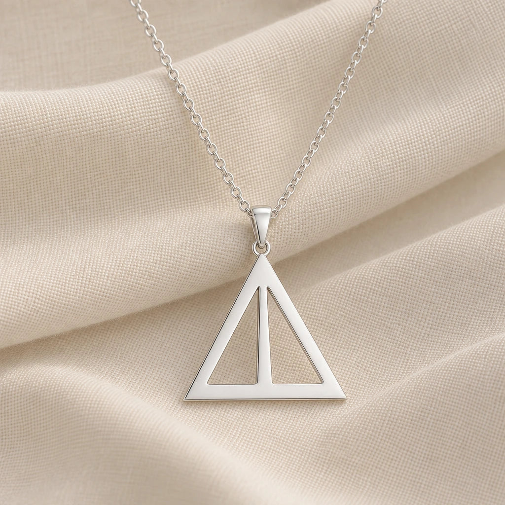 925 sterling silver asia asteroid symbol pendant necklace on cream fabric