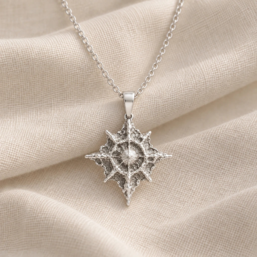 925 sterling silver polaris north star pendant necklace on cream fabric