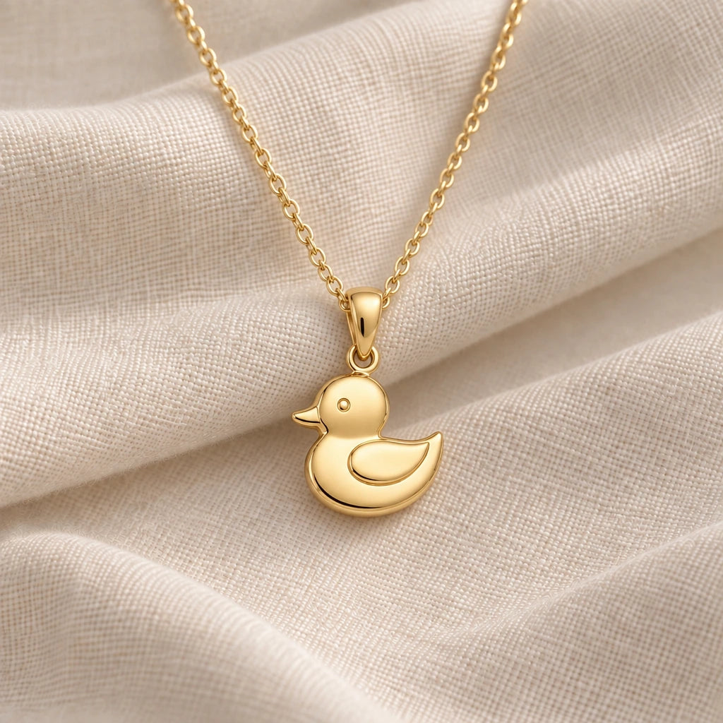 Rubber Duck pendant necklace in an 18k gold plated finish
