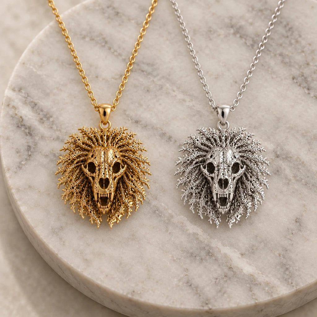 Ancient Lion Skull Crest pendant necklace in silver and gold finishes side by side