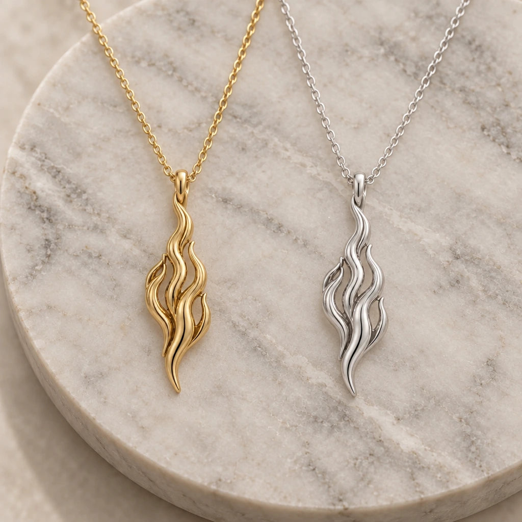 Flame of Venus pendant necklace in silver and gold finishes side by side