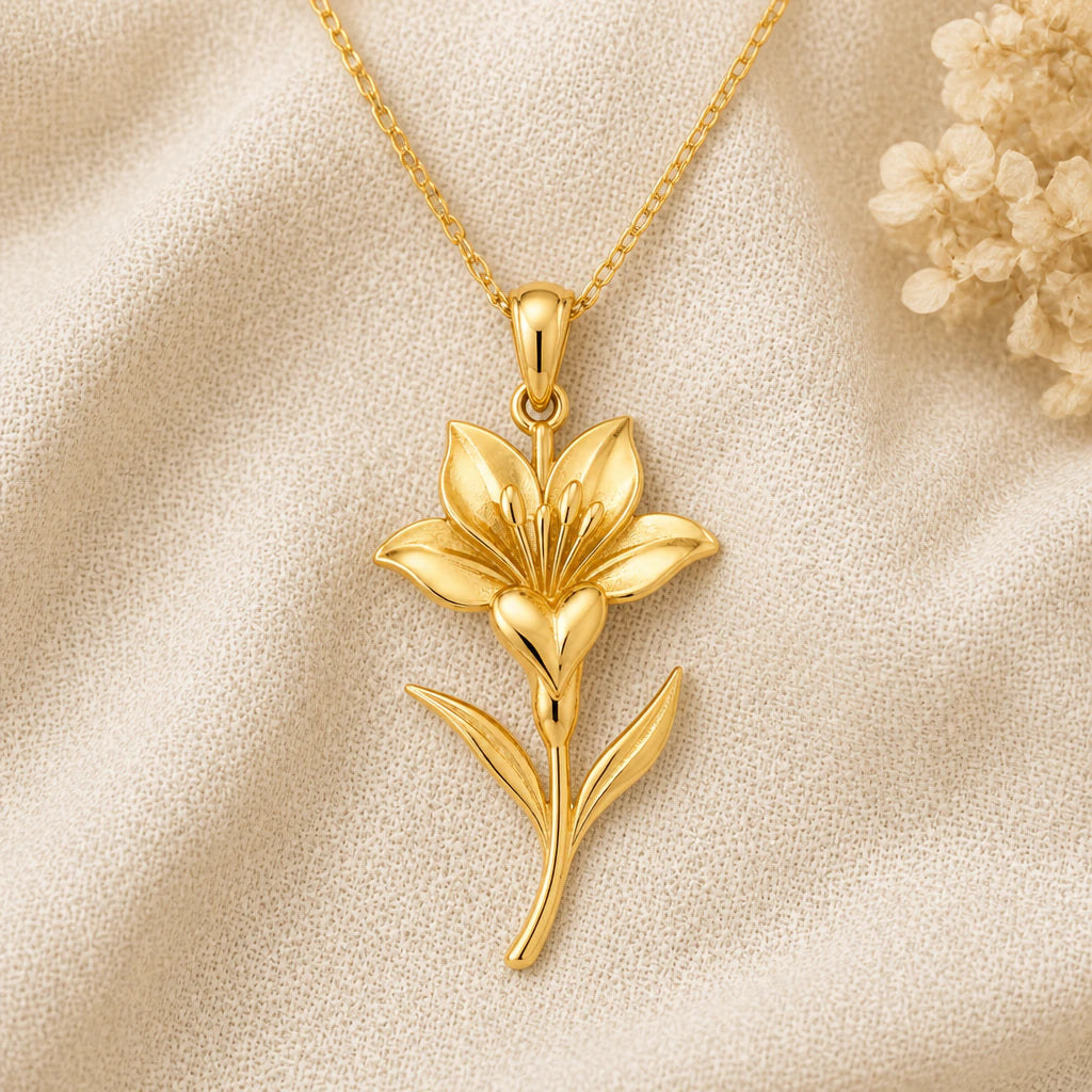 Saffron Crocus Flower pendant necklace in a warm gold finish on cream fabric