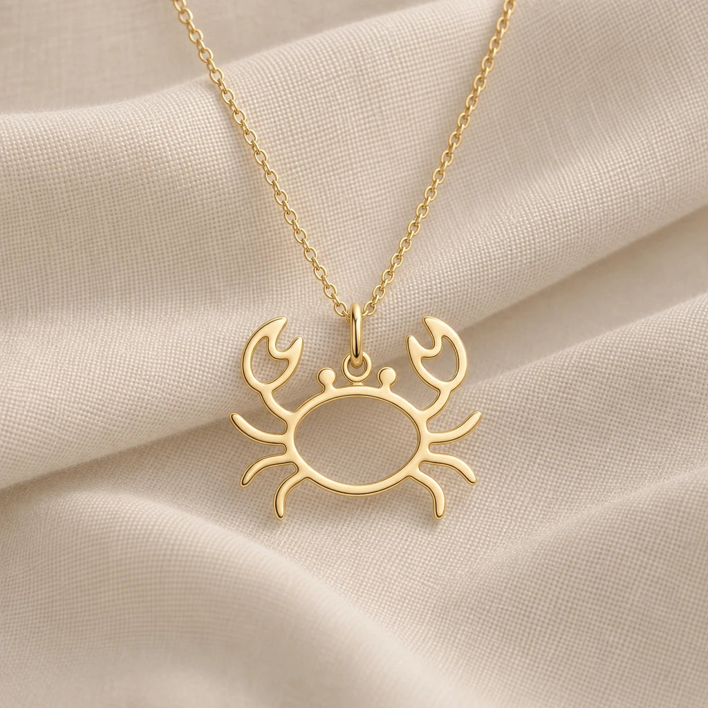 Crab Outline pendant necklace in an 18k gold plated finish