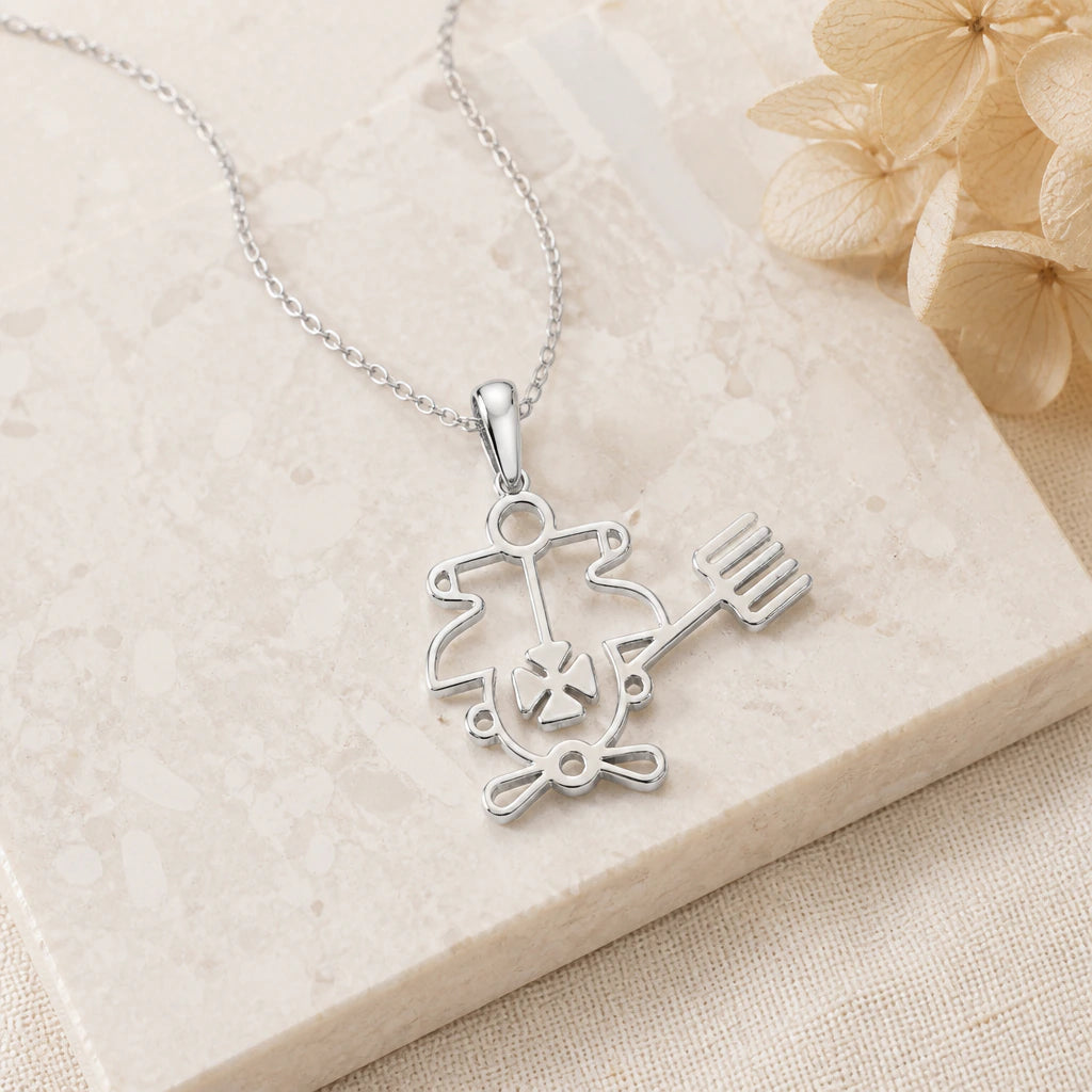 Close-up of silver purson seal pendant showing the sculpted detail