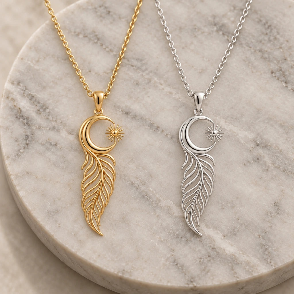 Eclipse Feather Moon pendant necklace in silver and gold finishes side by side