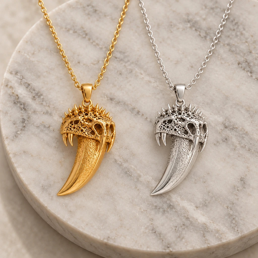 Ancient Sabre Tooth Fang pendant necklace in silver and gold finishes side by side