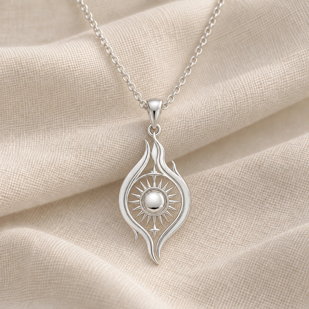 925 sterling silver astral flame sun pendant necklace on cream fabric
