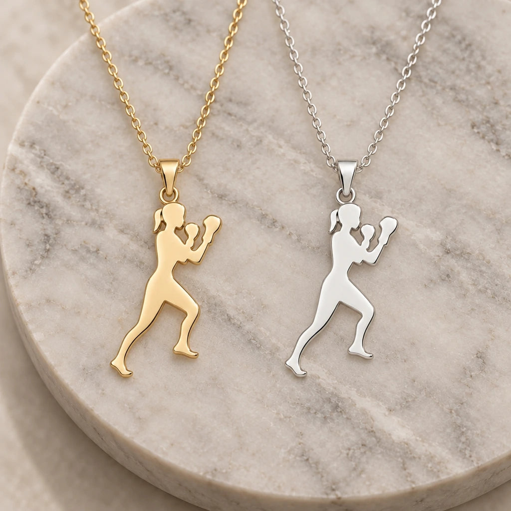 Boxer Woman Guard pendant necklace in silver and gold finishes side by side