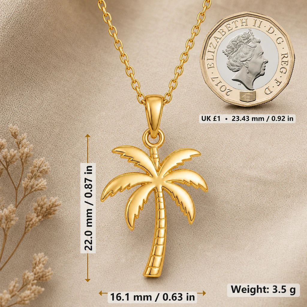 Palm tree necklace size image showing 22 mm height, 16.1 mm width and 3.5 g weight beside a UK pound coin