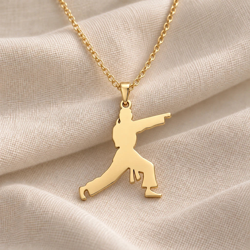 Karate Fighter pendant necklace in an 18k gold plated finish