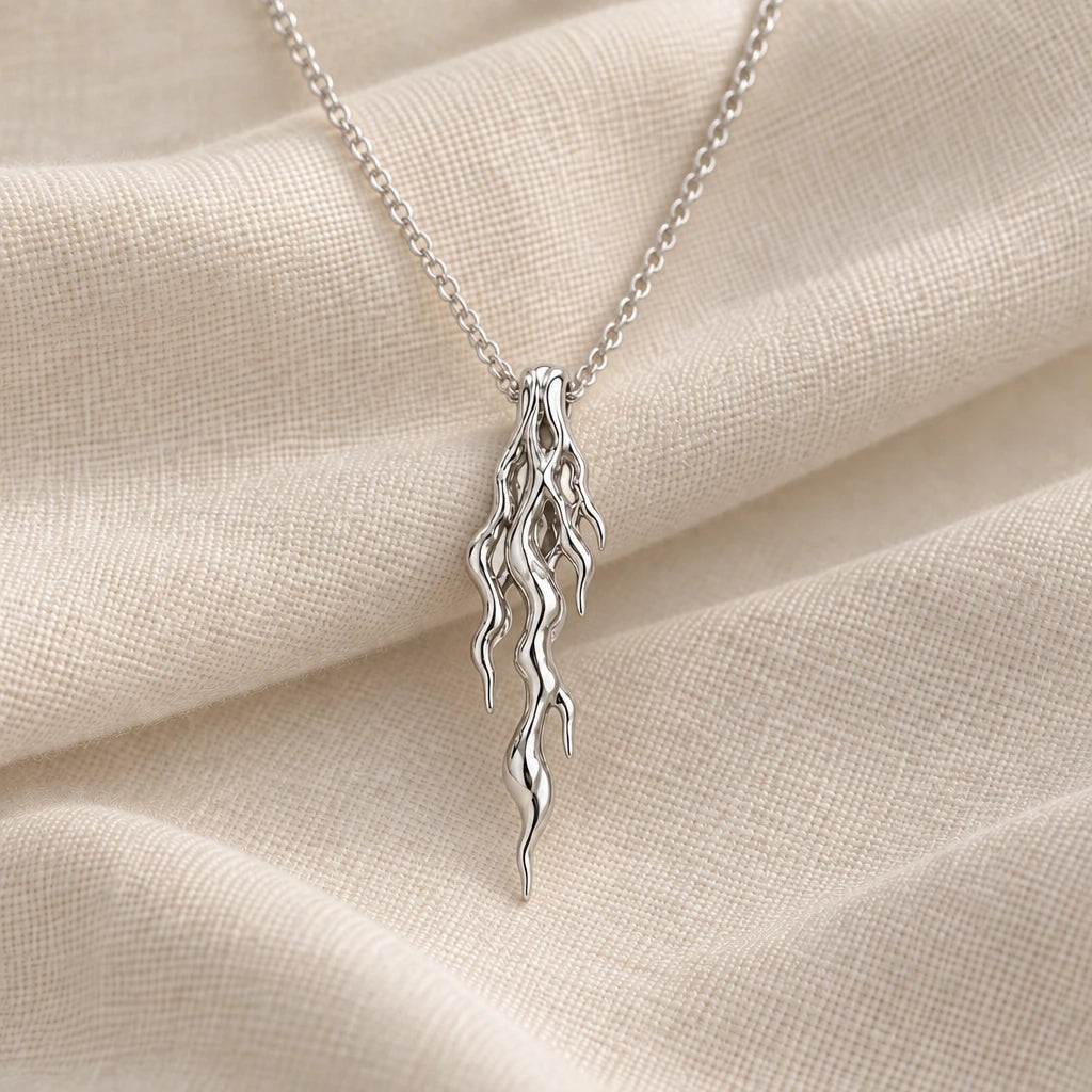 925 sterling silver molten vein pendant necklace on cream fabric
