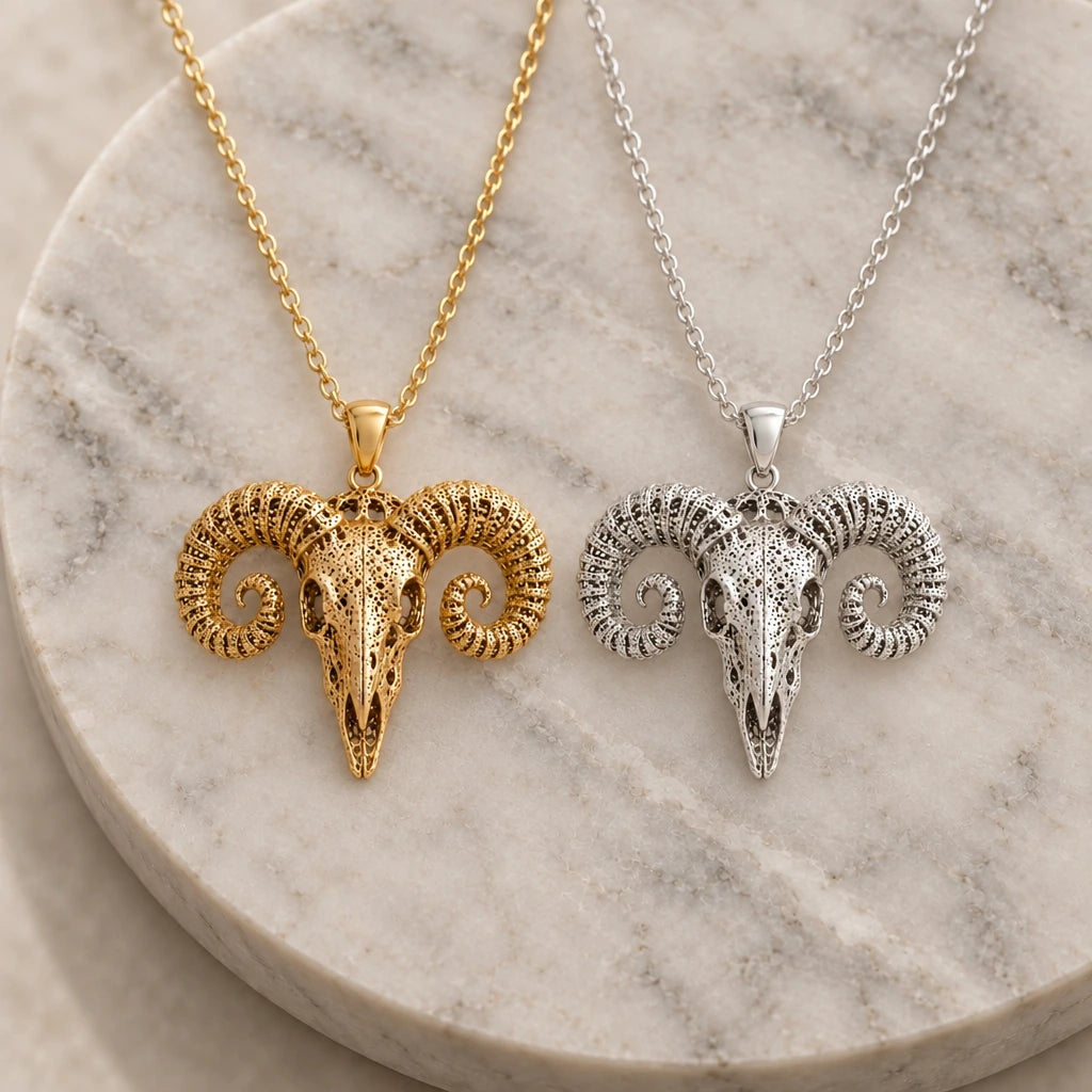 Ancient Ram Skull pendant necklace in silver and gold finishes side by side