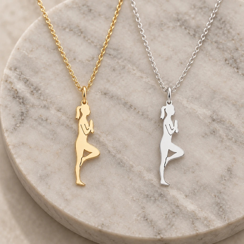 Yoga Tree Pose Woman pendant necklace in silver and gold finishes side by side