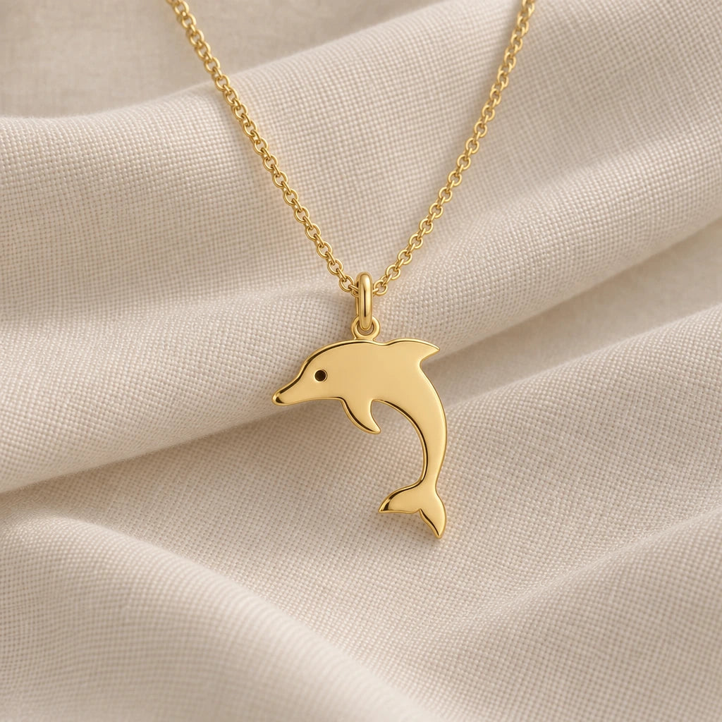 Dolphin Silhouette pendant necklace in an 18k gold plated finish