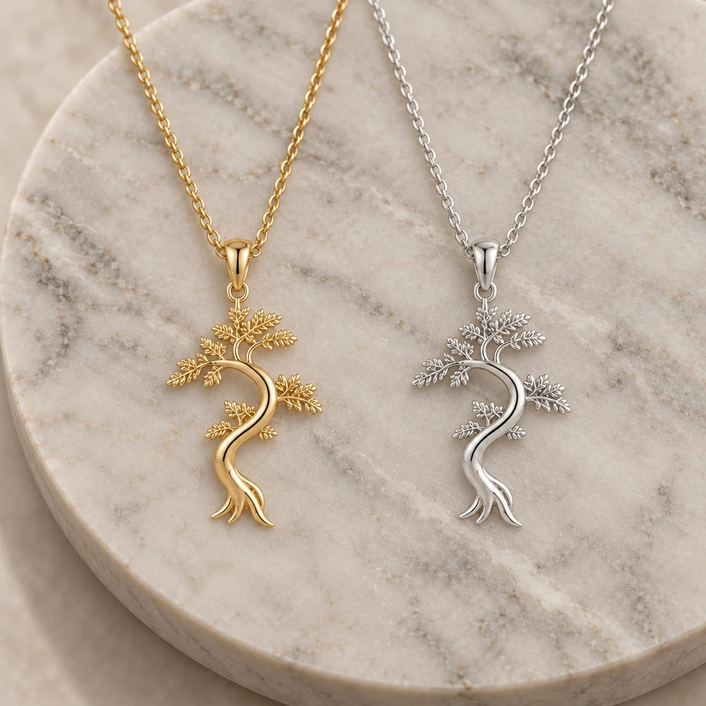 Juniper Flame Feathered Tree pendant necklace in silver and gold finishes side by side