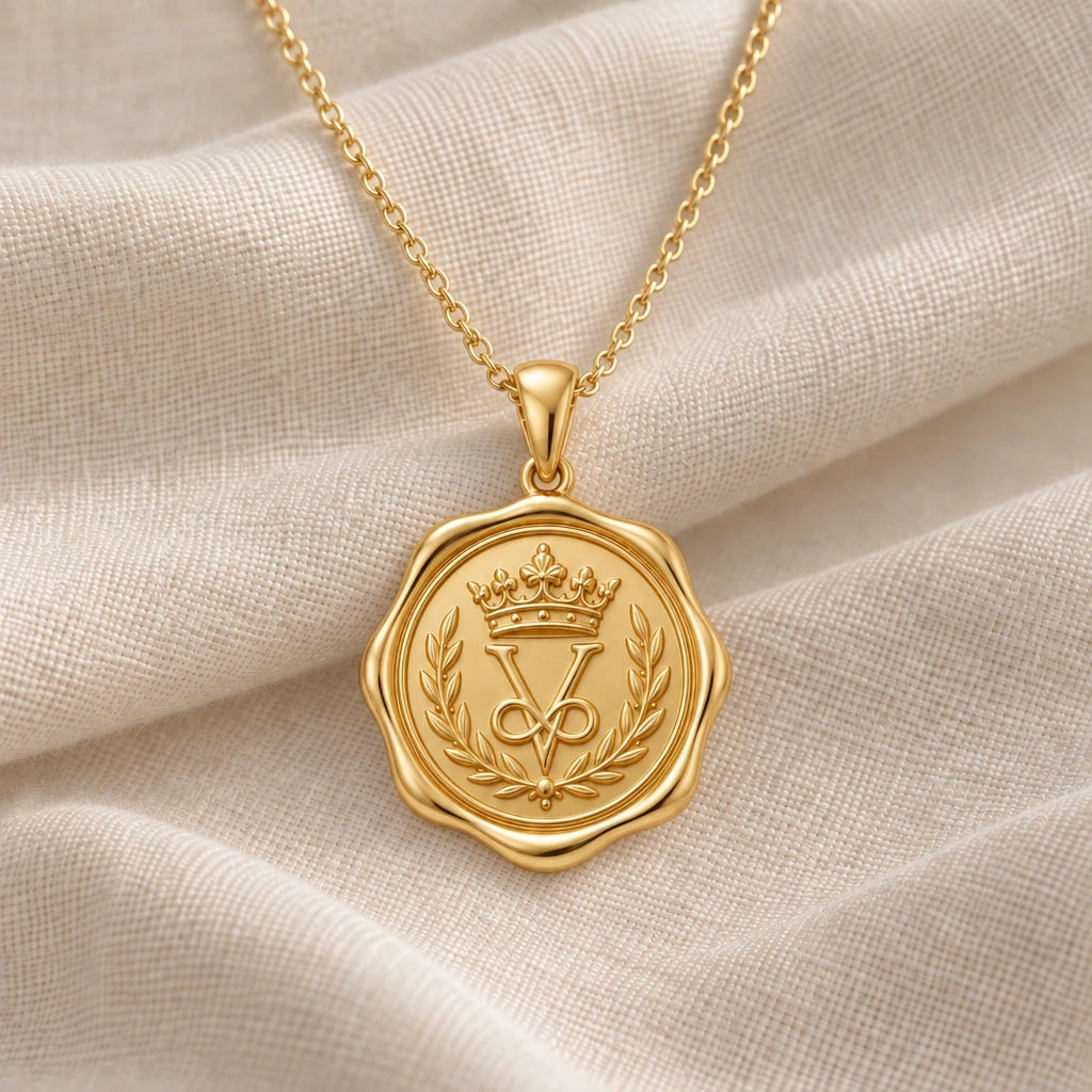 Crown Seal Medallion pendant necklace in an 18k gold plated finish