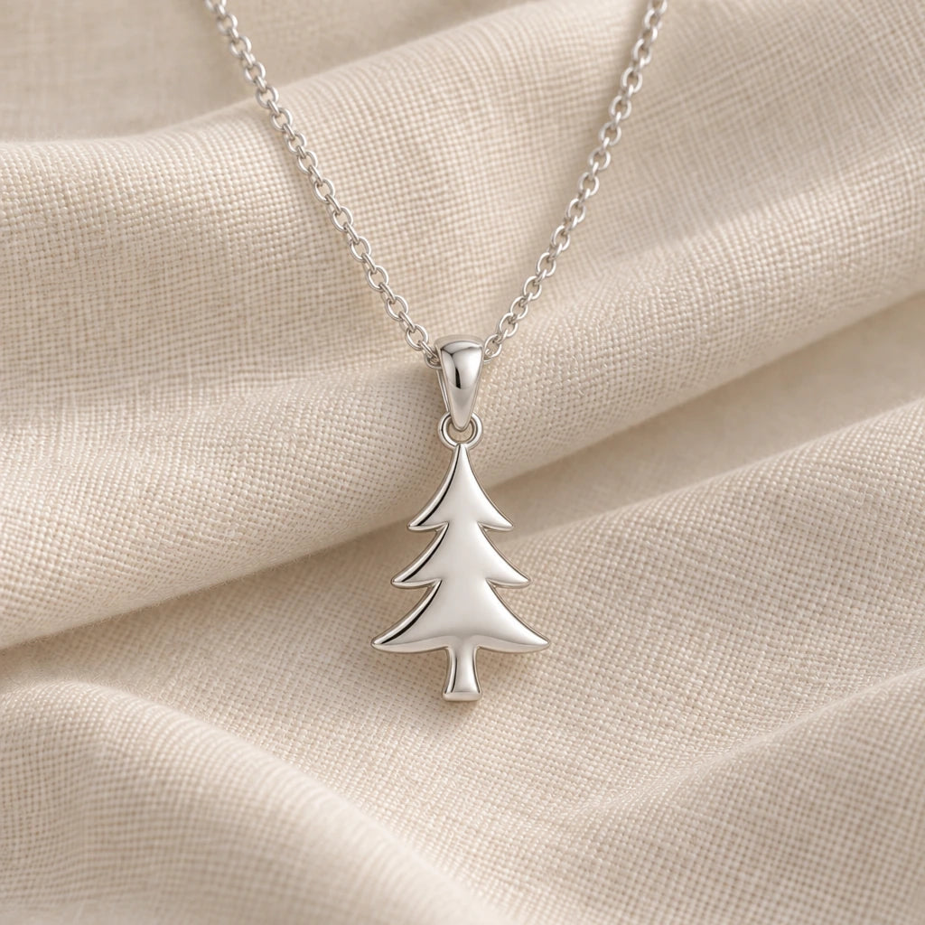 925 sterling silver pine tree solid pendant necklace on cream fabric