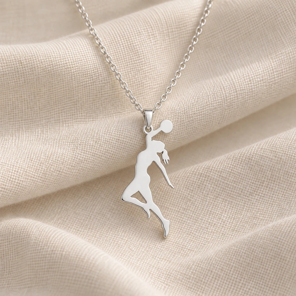 925 sterling silver basketball jump shot pendant necklace on cream fabric