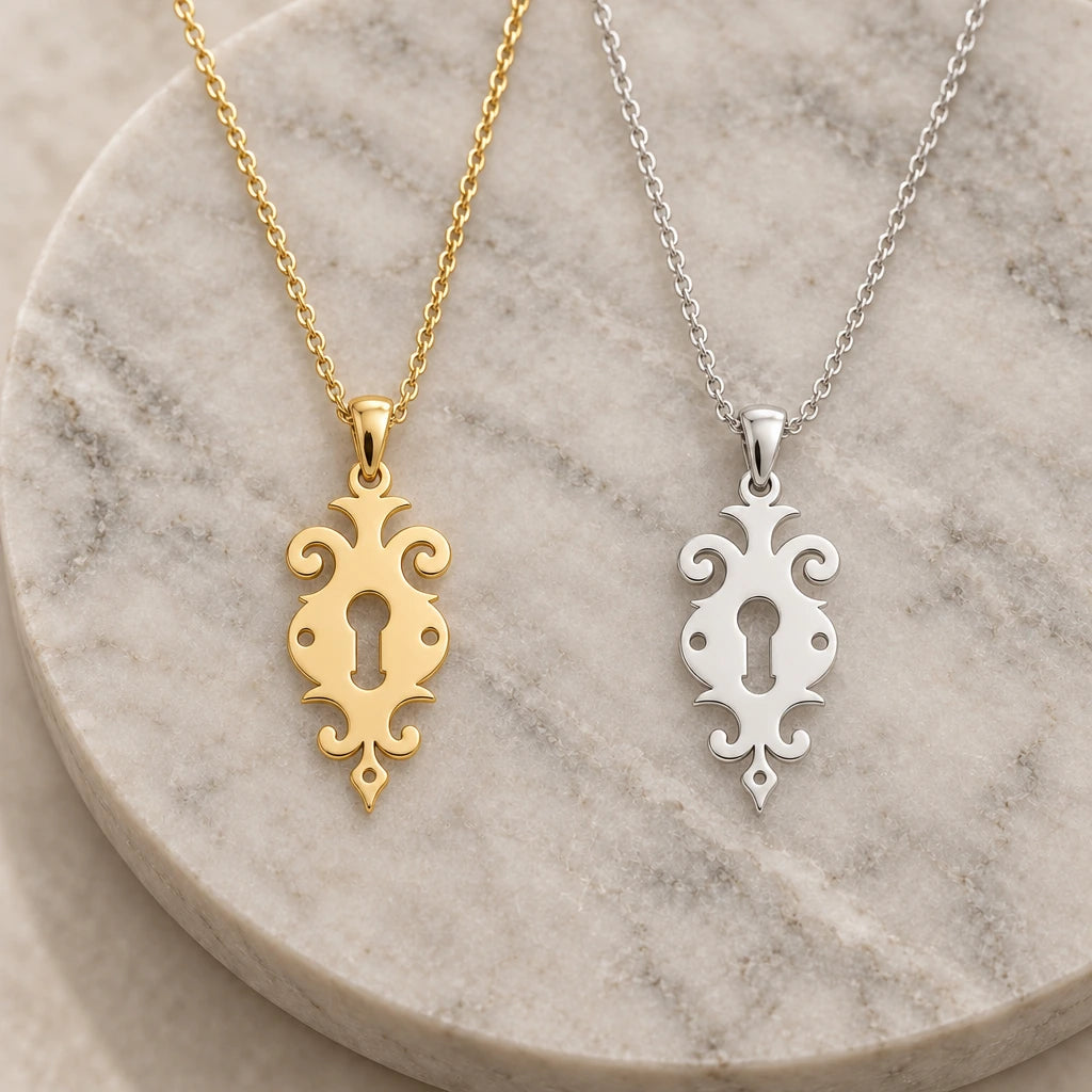 Ornate Keyhole pendant necklace in silver and gold finishes side by side