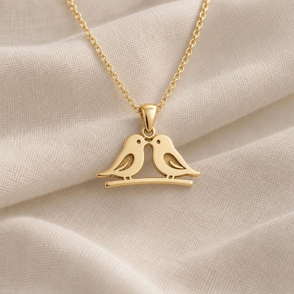 Love Birds pendant necklace in an 18k gold plated finish