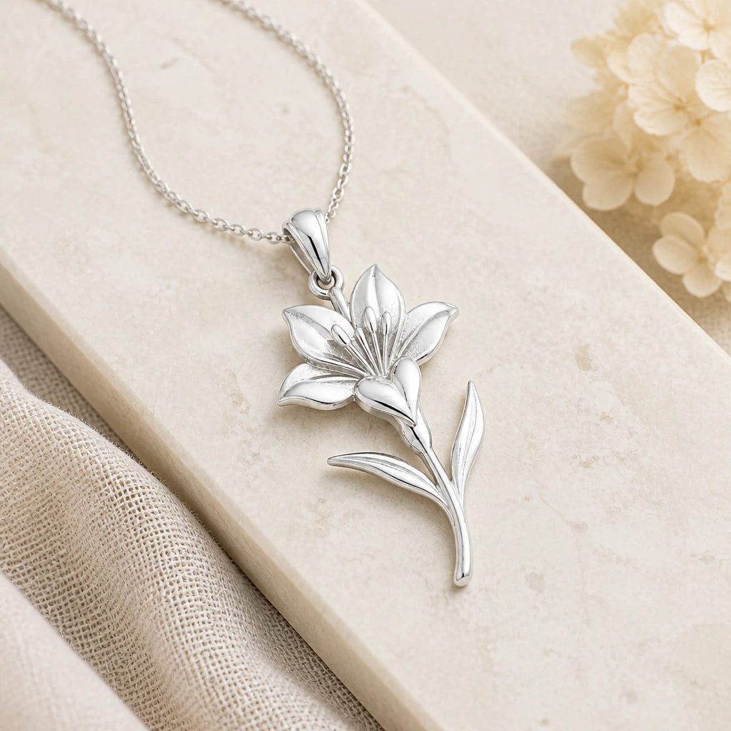 Close-up of silver saffron crocus flower pendant showing the sculpted detail