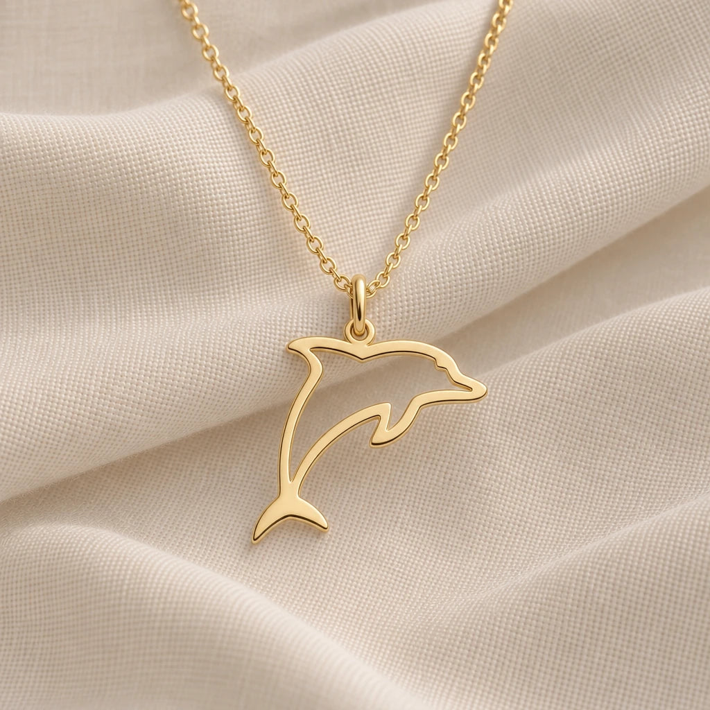 Leaping Dolphin Outline pendant necklace in an 18k gold plated finish