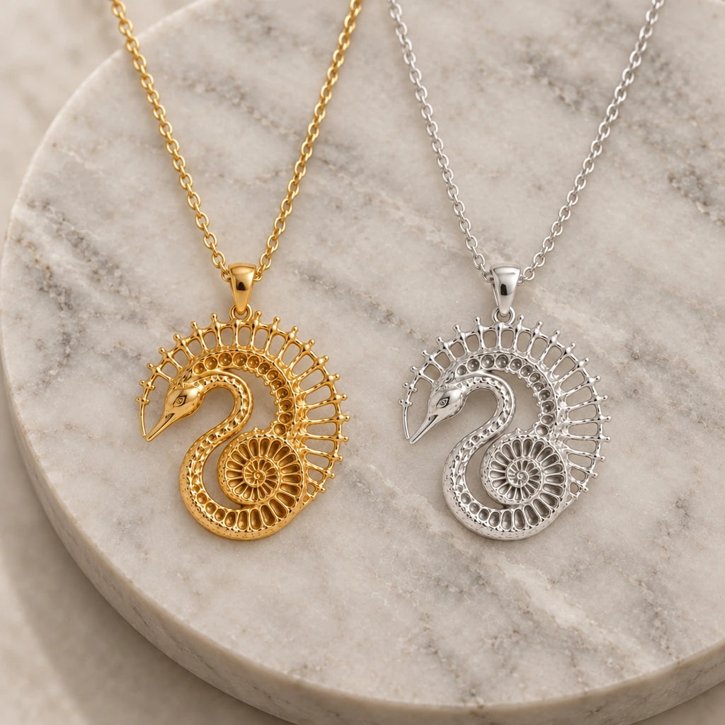 Fossil Swan Halo pendant necklace in silver and gold finishes side by side