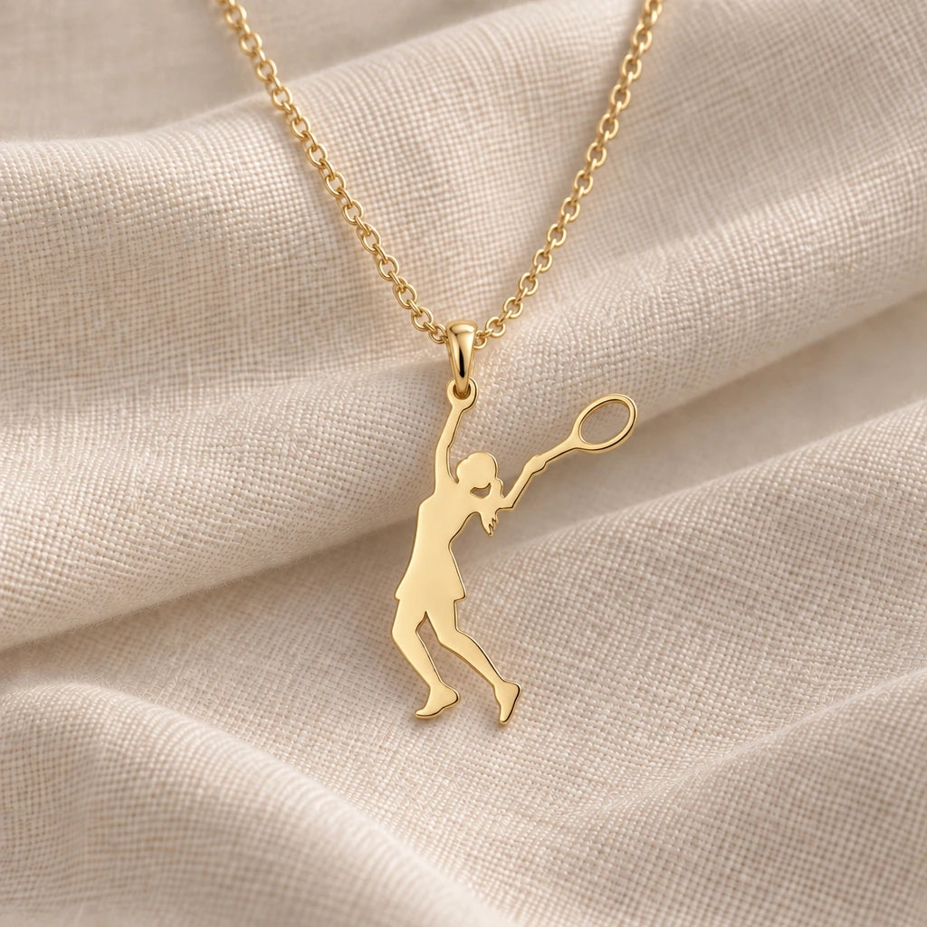 Tennis Player Serve pendant necklace in an 18k gold plated finish