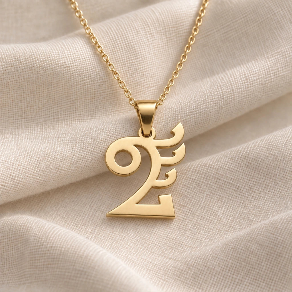 Quetzalcoatl Symbol pendant necklace in an 18k gold plated finish